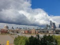 Thames, St Paul`s Cathedral and the City of London, business district set against a dramatic sky as seen from the Tate Modern Royalty Free Stock Photo