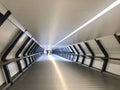 London, United Kingdom - June 29, 2019: Bridge to One Canada, a public pedestrian cross rail footbridge in Canary Wharf Royalty Free Stock Photo