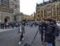 TV crew stationed in front of the abbey entrance of Westminster Abbey