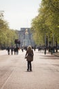 Female wearing rollerblades skates along The Mall