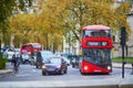 LONDON, UNITED KINGDOM - NOVEMBER 13, 2021: Famous double decker red buses on a street of London