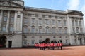 LONDON, UNITED KINGDOM - October 25, 2013: Officers and soldiers of the Coldstream Guards march in front of Buckingham Palace duri