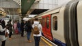 London, United Kingdom - October 20, 2017: People waiting at underground tube platform for train to arrivin Hammersmith undergroun
