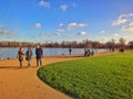 London, United Kingdom - October 2015: People walking, exercising and chilling at Hyde Park