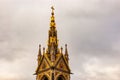 High top of the rich decorated classic tower of the catholic church in London