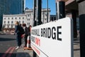 People crossing the Vauxhall Bridge road in London