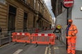 London - 2019: White Horse Street is blocked, man in work clothes is standing