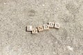 London word on wood cubes . On the beach sand by the sea Royalty Free Stock Photo
