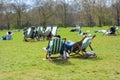 londoner sit on deckchairs in Hyde Park. London, England Royalty Free Stock Photo