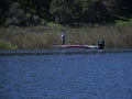 A lone angler fishes at Cachuma Lake in Santa Barbara County