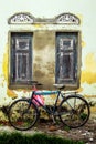 Lone bicycle in front of decaying colonial building in Gall, Sri Lanka