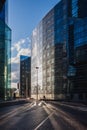 A lone bicyclist at sunset in the Paris business district of La Defense