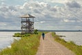 Lone biker on a pier in Liepaja lake