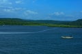 Lone boat in blue sea