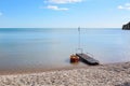 Lone boat moored on a portable jetty Royalty Free Stock Photo