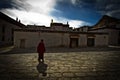 A lone Buddhist monk of Tashilompu Monastery Shigaste Tibet