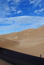 Lone Climber in the Sand Dunes