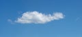 Lone cloud in tropical blue sky panorama