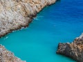 Lone diver swimming. Amazing narrow sea cove, amazing blue water