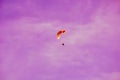 Electric powered parachute in purple sky Royalty Free Stock Photo