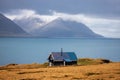 Lone farm house by the shoreline in Iceland Royalty Free Stock Photo