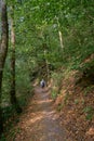 Lone Female Hiker travelling along a path on her way to Burg Eltz in Germany