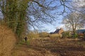 A lone Female Walker on the footpath on the edge of Friockheim Village at the old Historical Mill Pond Area Royalty Free Stock Photo