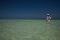 Lone figure on beach in Michamwi-Pingwe Zanzibar, Royalty Free Stock Photo