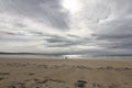 Lone Figure on an Empty Beach