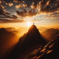 Man stands on mountain path with glorious sunset