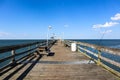 Lone Fishing Pole on Ocean View Pier Royalty Free Stock Photo