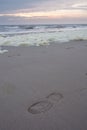 Lone footprint at beach