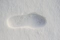 lone footprint or boot on the snow the next person