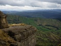 Lone hiker enjoying backcountry nature landscape mountain panorama at Bell Rock lookout in Tutira Hawkes Bay New Zealand