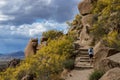 Lone Hiker Going Up Desert Hiking Trail In Arizona