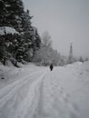 Lone hiker in the mountain snow