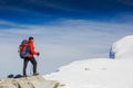 Lone hiker in winter mountains