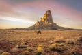 A horse grazing in front of Agathla Peak, north of Kayenta, Arizona Royalty Free Stock Photo