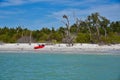 Lone kayak rests on beach at Cayo Costa park