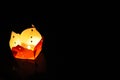 A lone lantern in the night during the Floating Lantern Festival