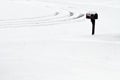 Lone Mailbox in a Snow Shower Royalty Free Stock Photo