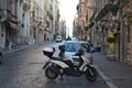 A lone motor scooter in Rome Italy