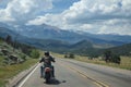 Lone Motorcyclist on Scenic Mountain Road Journey