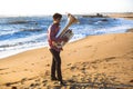 Lone musician playing the Tuba on the Ocean coast. Royalty Free Stock Photo