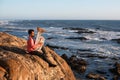 Lone musician playing the Tuba on the sea coast. Royalty Free Stock Photo