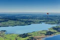 Lone paraglider over the lakes of Bavaria