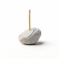 a lone pebble perched on a white surfac a group of matchstick a Royalty Free Stock Photo