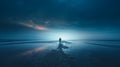 a lone person standing on the beach at night