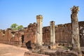 Lone pillars in front of old broken crumbling ancient ruins of angkor wat, cambodia