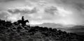 One cowboy horse Ridge Rider Silhouetted Royalty Free Stock Photo